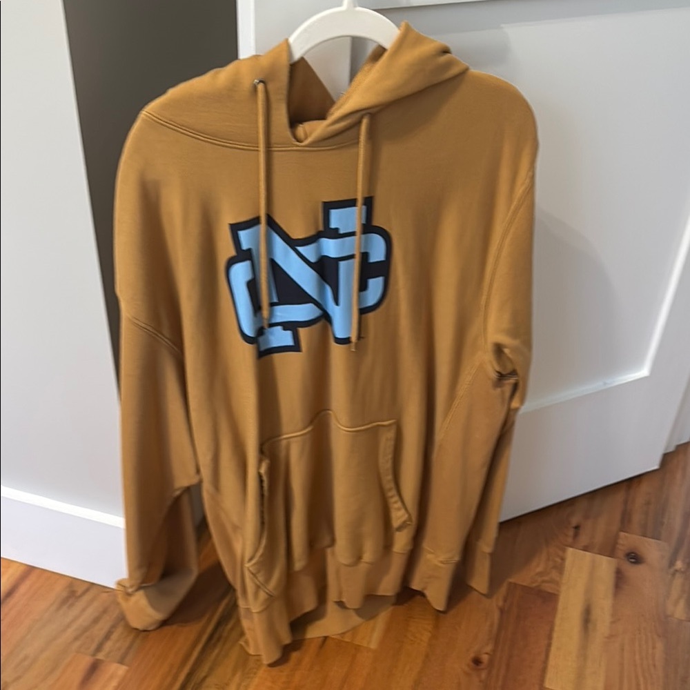 Champion Tan Hoodie with Blue Graphic